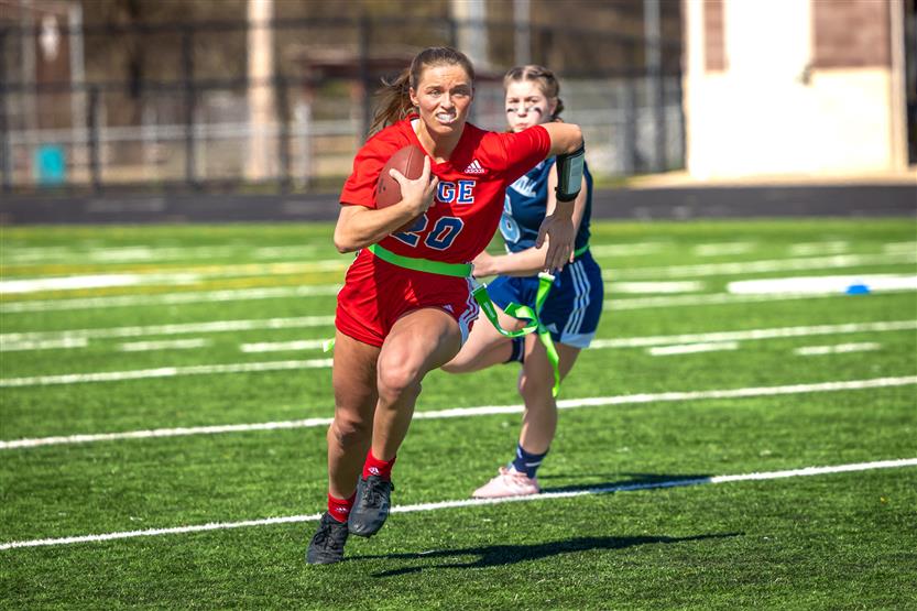 Students play flag football